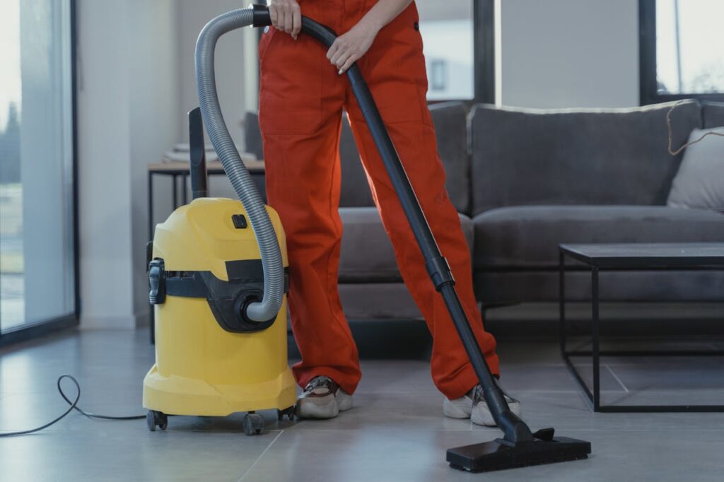 person-using-a-vacuum-6195273 Post-Construction Cleaning